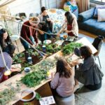 Participants engaging in an aesthetic intelligence workshop, exploring creativity and well-being.