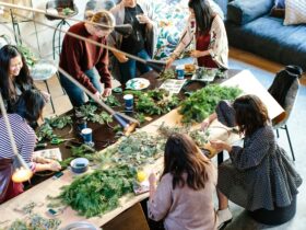 Participants engaging in an aesthetic intelligence workshop, exploring creativity and well-being.