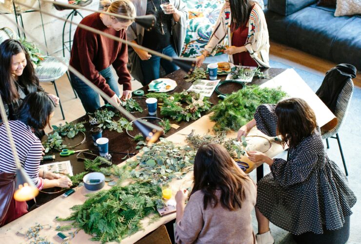 Participants engaging in an aesthetic intelligence workshop, exploring creativity and well-being.